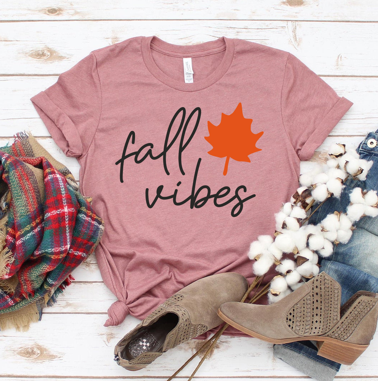 A stylish Fall Vibes T-shirt made from premium ring spun cotton, featuring a vibrant autumn-themed design.