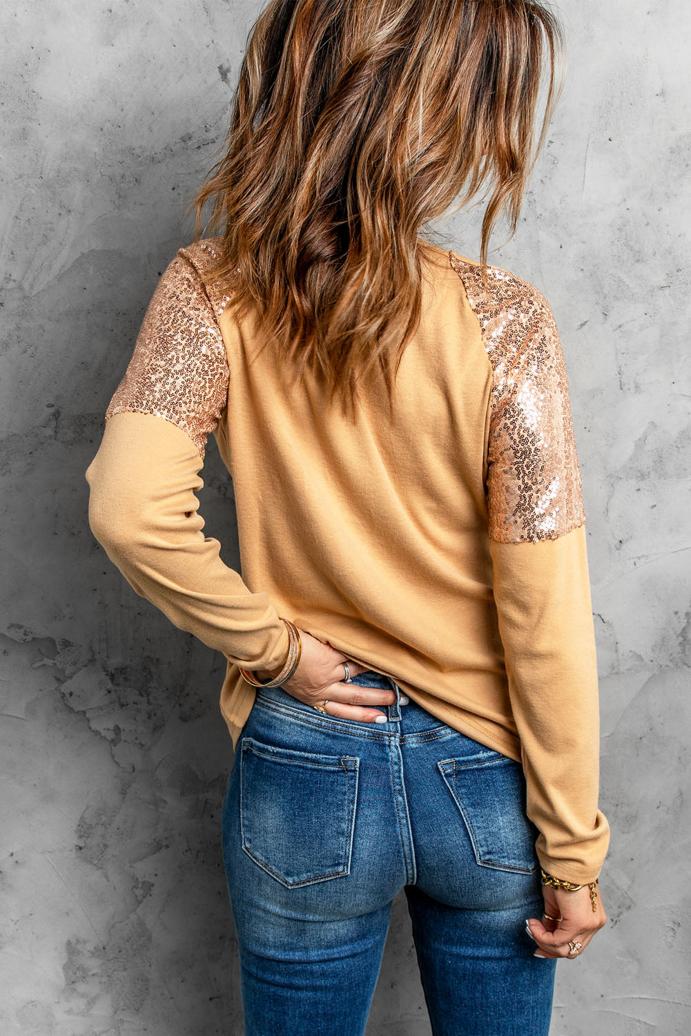 Fashion Apricot Sequin Shoulder Long Sleeve Top featuring a round neckline and sequin shoulder detailing, made from soft knit fabric.