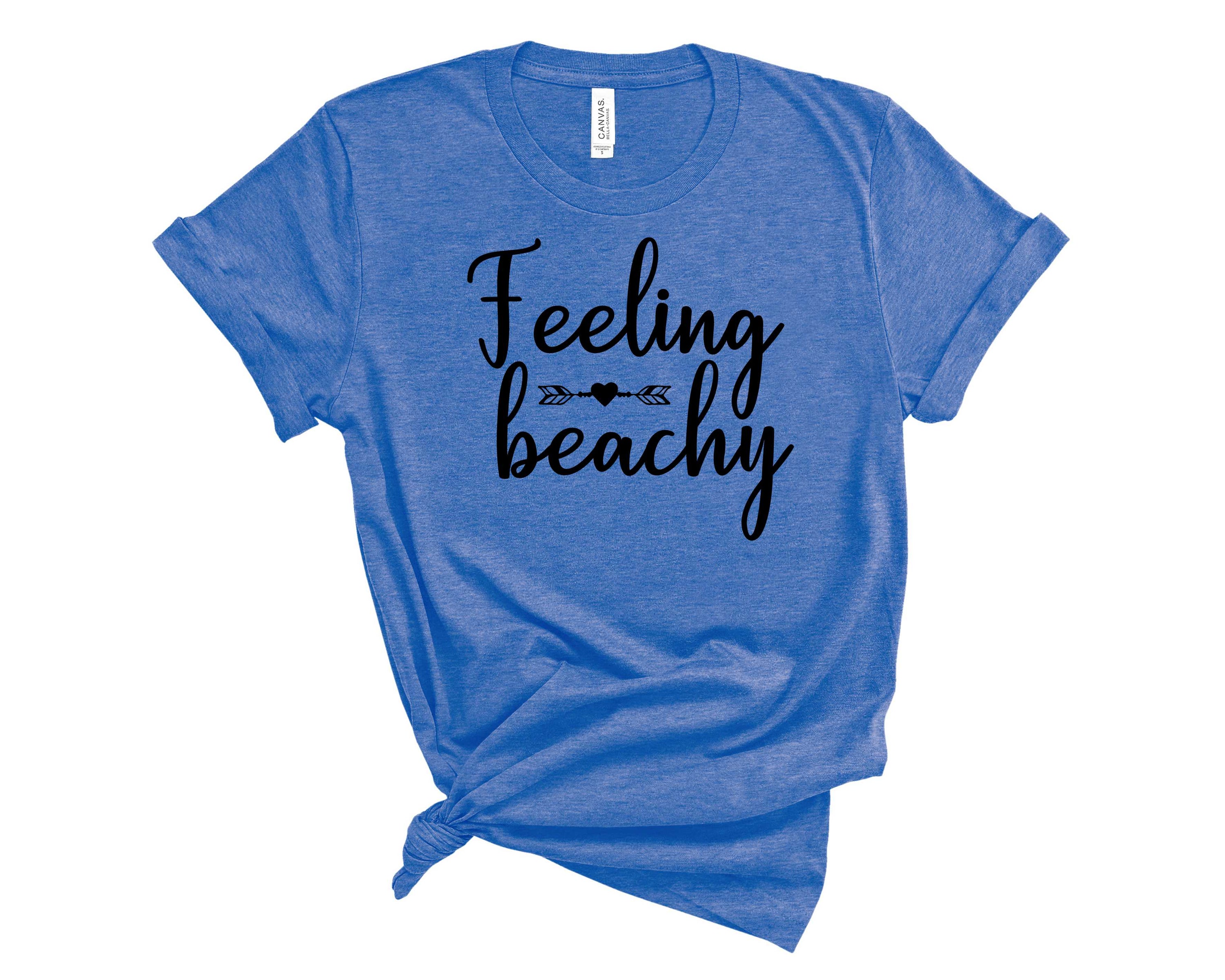 Feeling Beachy Arrow Graphic Tee featuring a vibrant beach-themed design, perfect for summer wear.