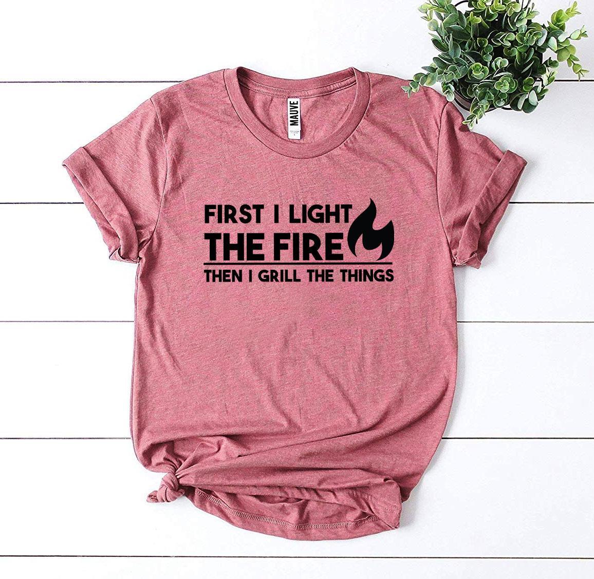 First I Light The Fire T-shirt made of premium ring spun cotton with a striking design and soft textile flex print.