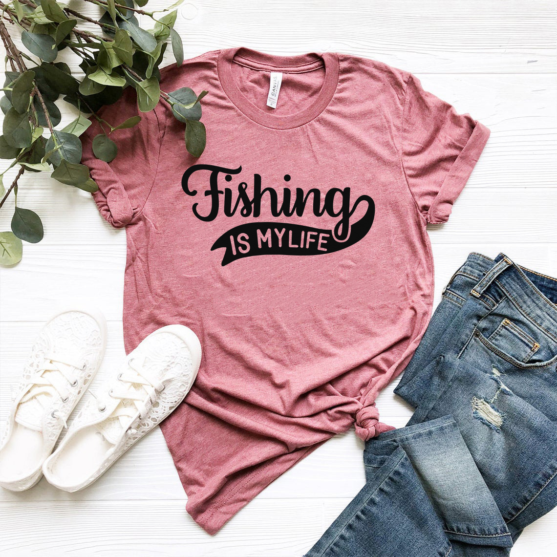 Unisex Fishing Is My Life T-shirt in various colors, showcasing its soft fabric and stylish design.