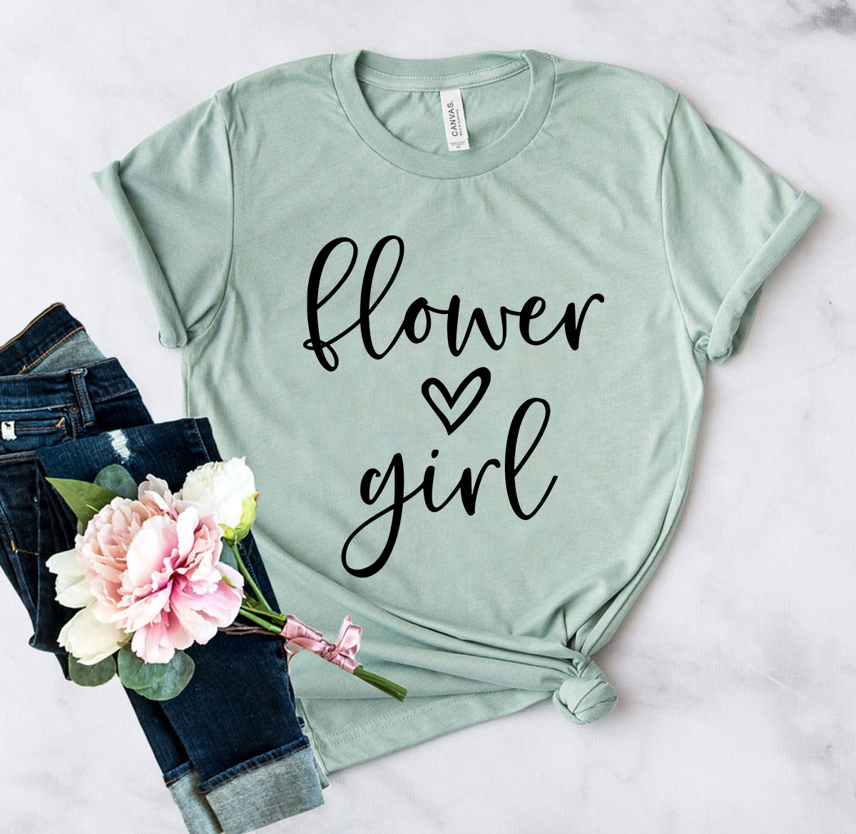 A stylish unisex Flower Girl Shirt made from soft ring spun cotton, available in multiple colors and sizes.