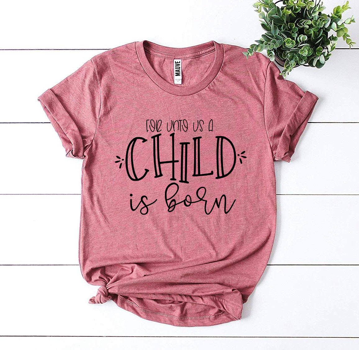 For Unto Us a Child Is Born T-shirt made of premium ring spun cotton with a festive design.