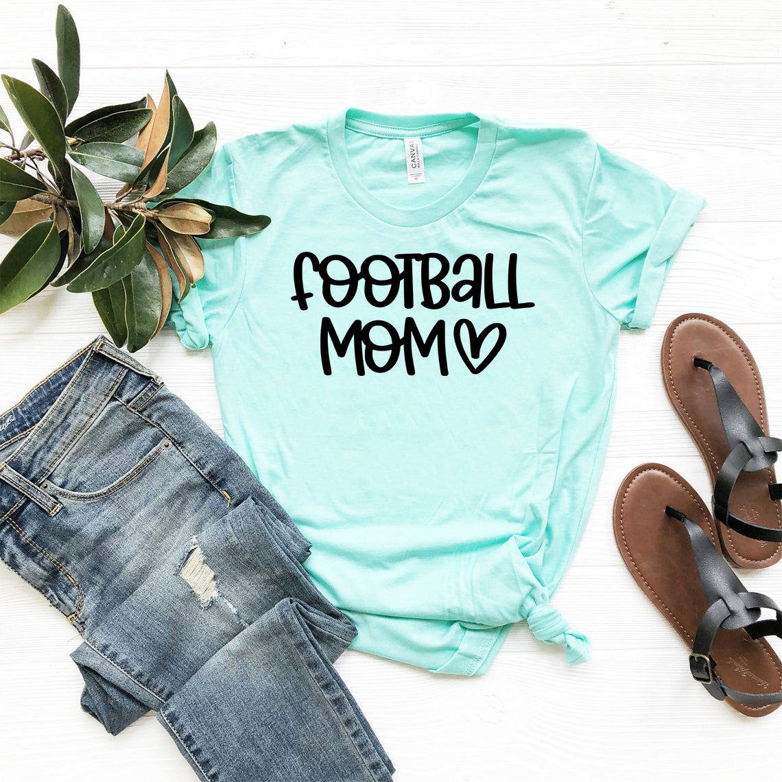 A stylish unisex Football Mom Shirt in various colors, showcasing its soft fabric and modern fit.