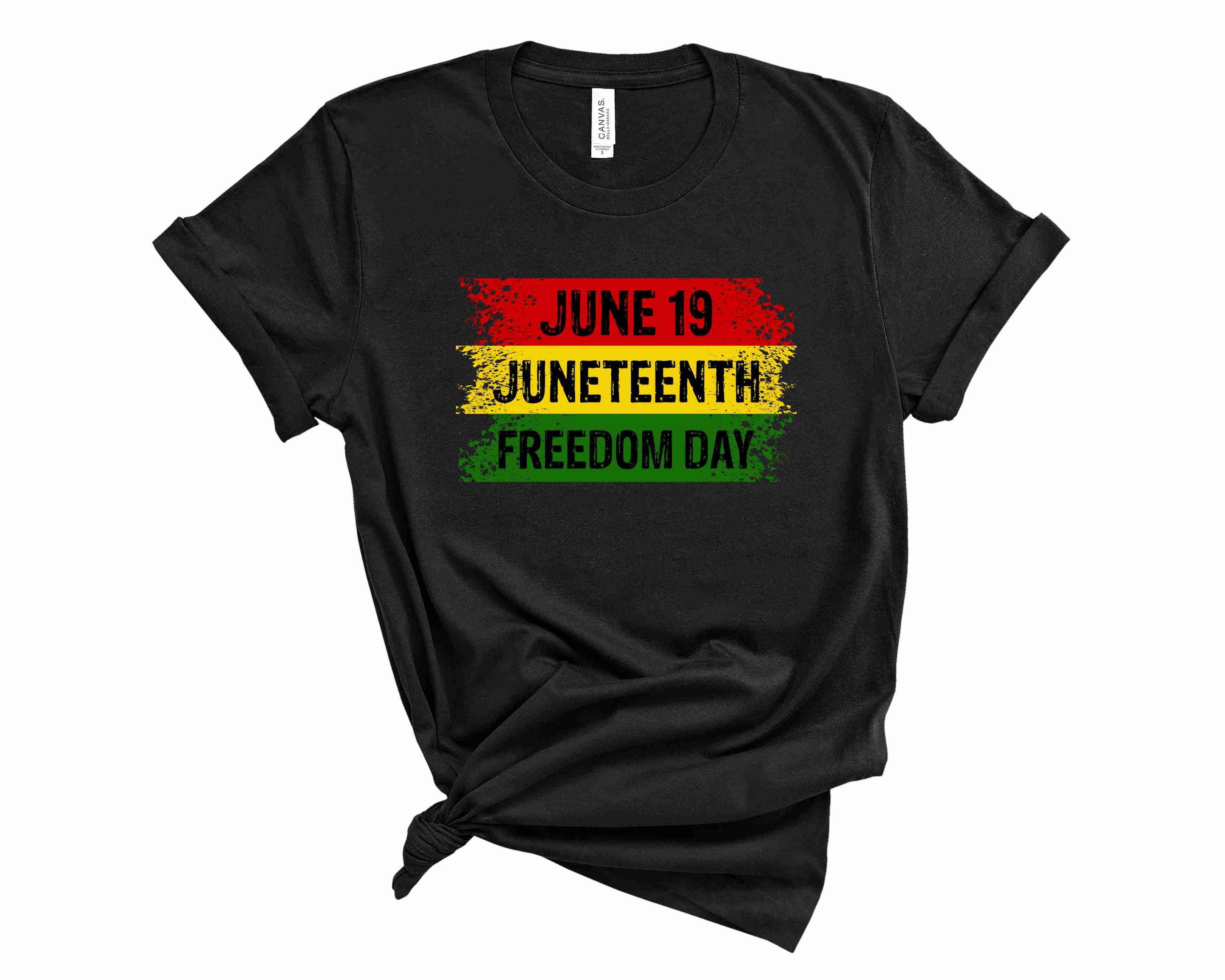 A unisex graphic tee featuring a vibrant Freedom Day banner design, perfect for casual wear.