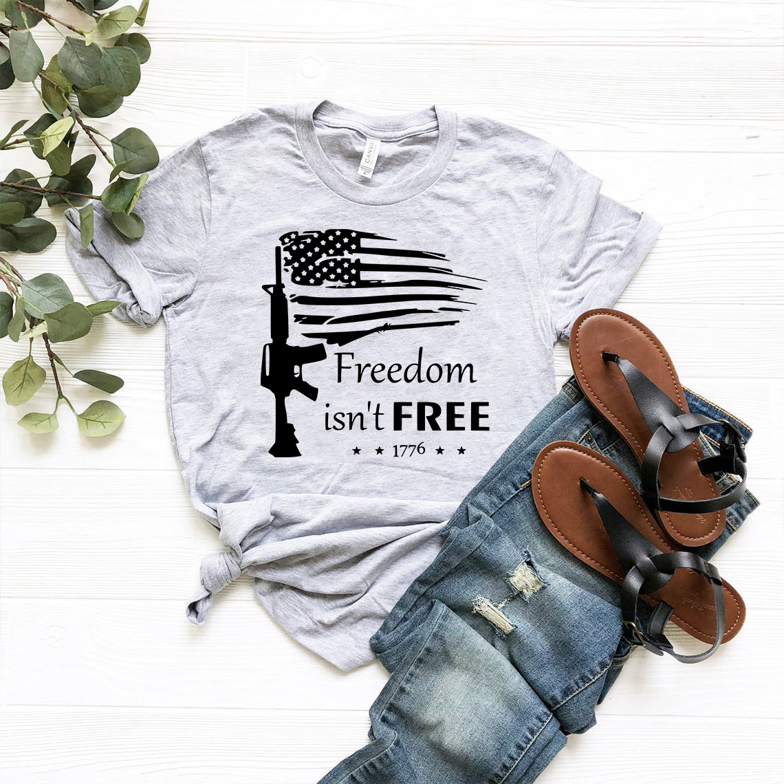 A unisex Freedom Isn't Free Shirt displayed in multiple colors, showcasing its comfortable fabric and stylish design.