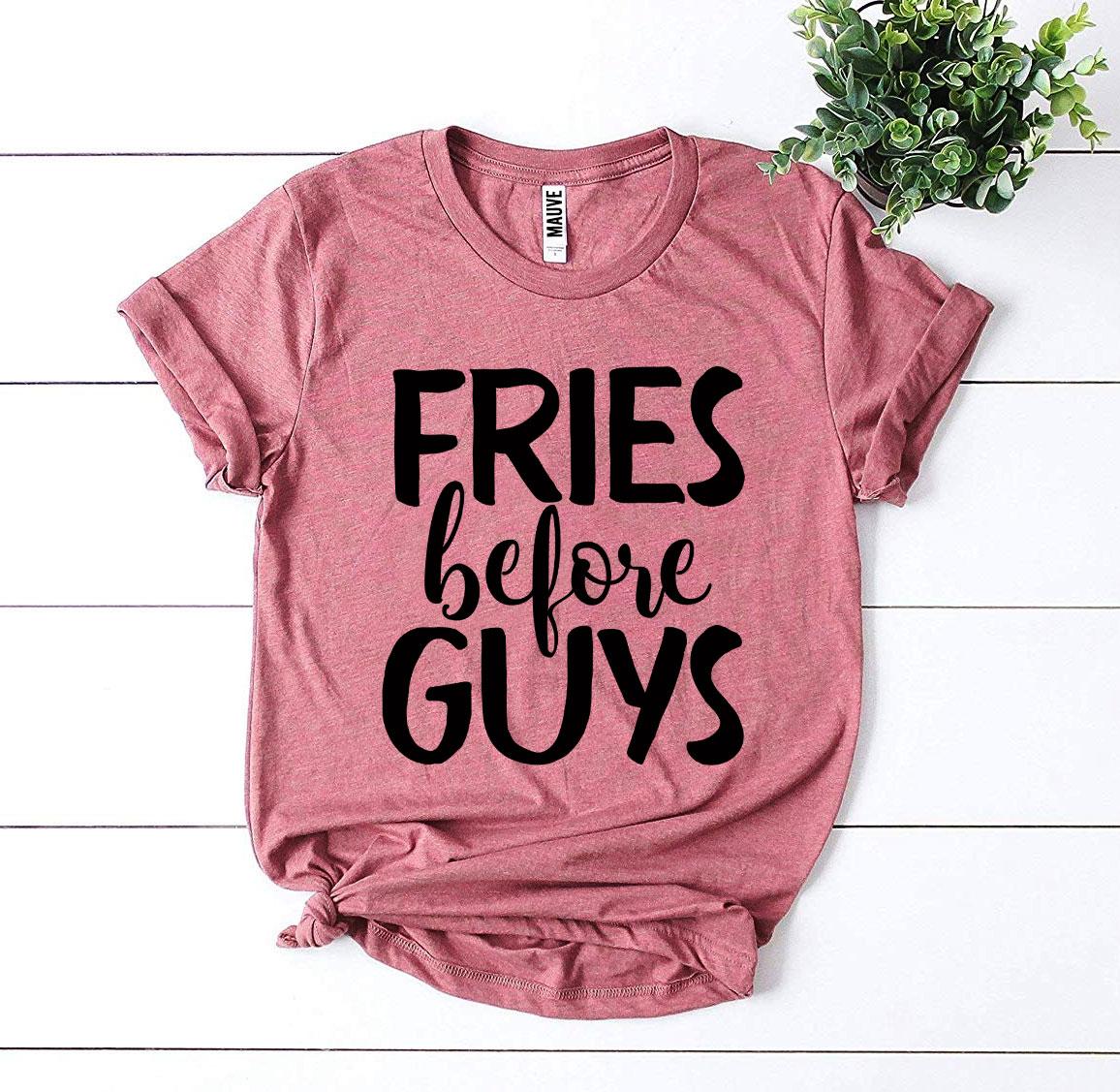 Fries Before Guys T-shirt in premium ring spun cotton with a trendy slogan design.