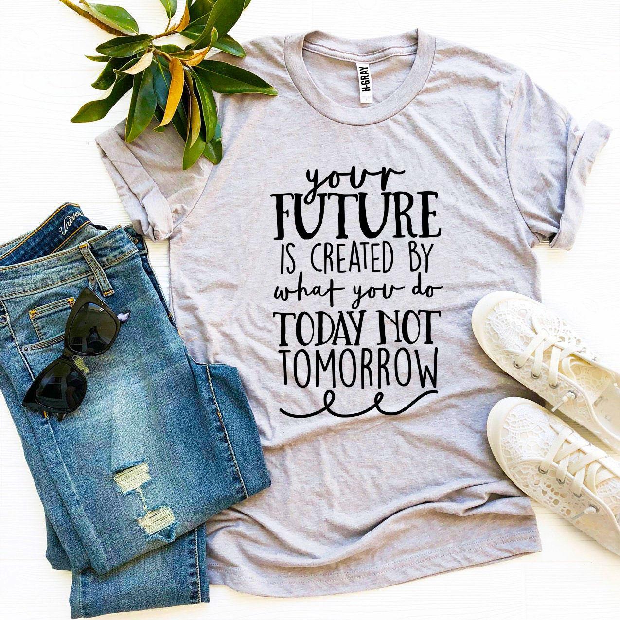 A stylish black t-shirt featuring the phrase 'Future Is Created By What You Do Today' in a high-quality print, made from soft ring spun cotton.