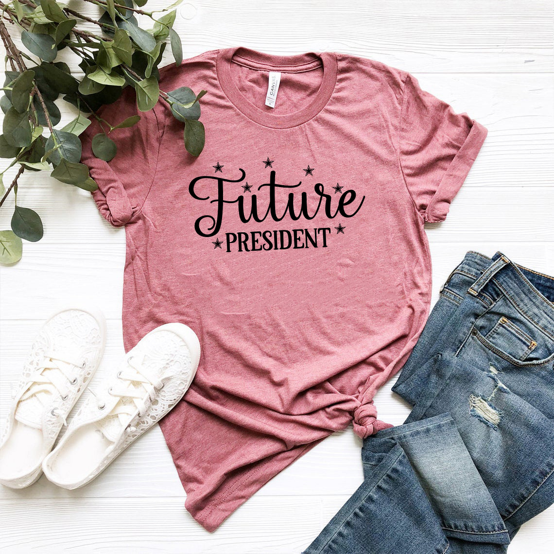 Future President Unisex T-shirt in various colors, showcasing its soft fabric and stylish design.