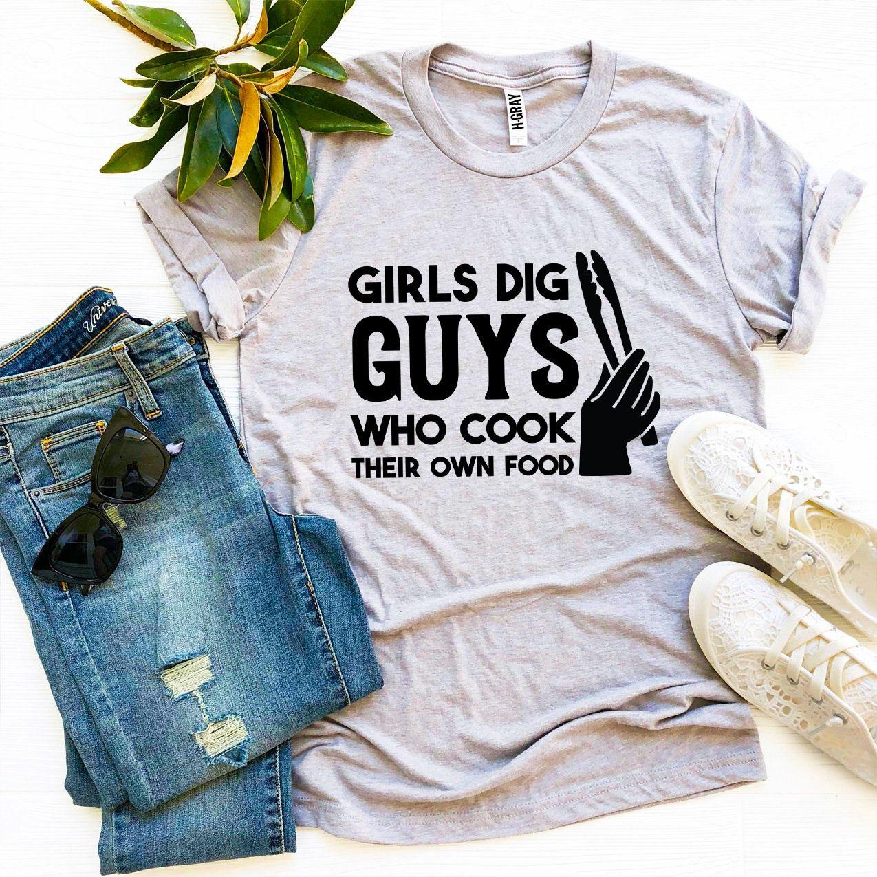 Girls Dig Guys Who Cook Their Own Food T-shirt in premium quality cotton, showcasing a fun cooking-themed design.