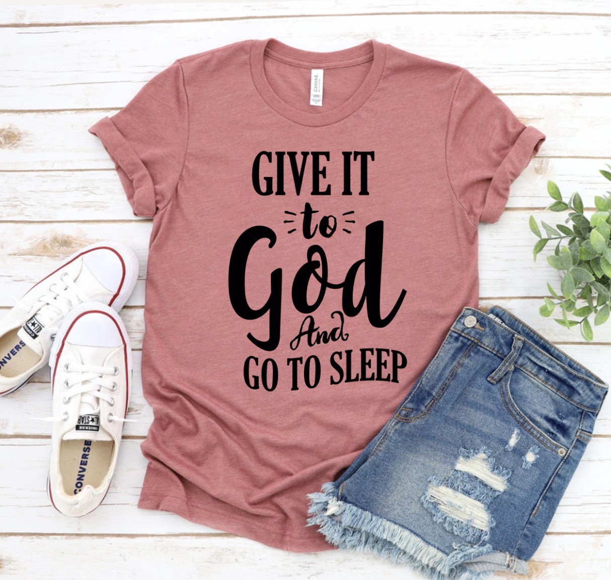 A soft, premium quality t-shirt featuring the phrase 'Give It To God And Go To Sleep' in a stylish flex print, available in various sizes.