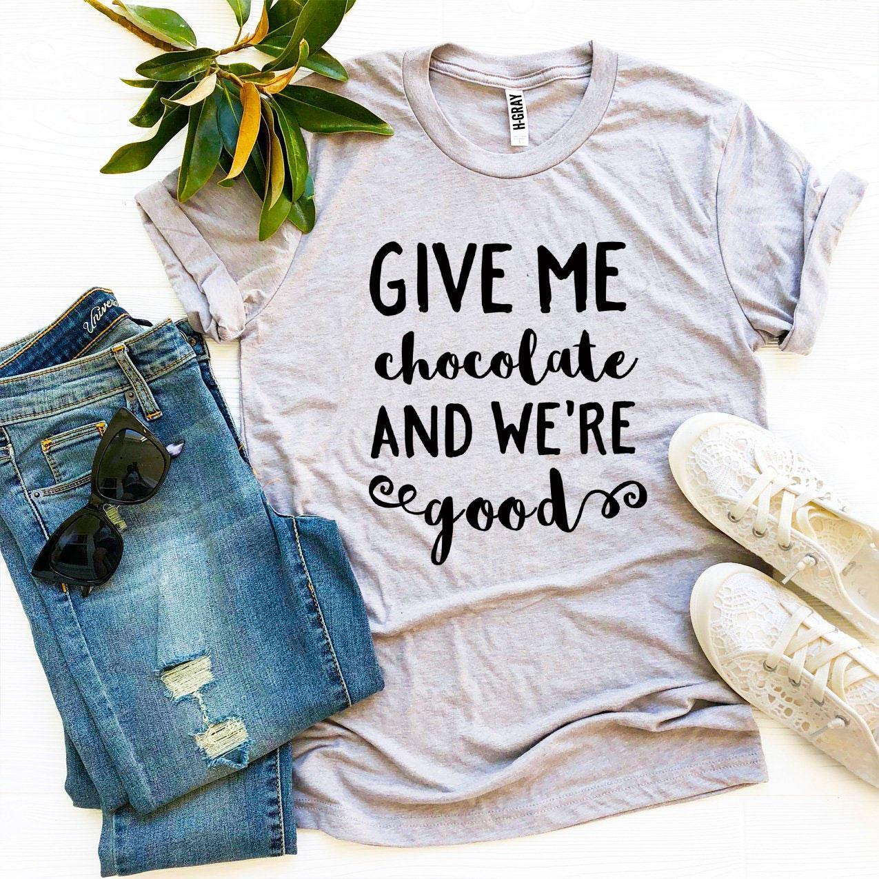 A stylish 'Give Me Chocolate And We’re Good' T-shirt made from premium ring spun cotton, featuring a playful chocolate-themed design.