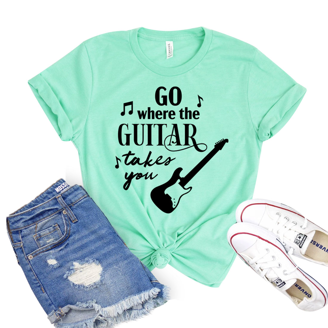 A stylish unisex t-shirt featuring the phrase 'Go Where The Guitar Takes You', made from soft airlume cotton, perfect for music lovers.