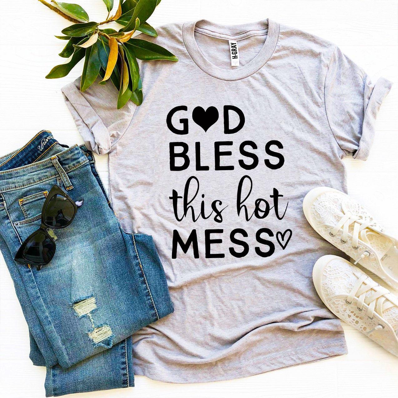 God Bless This Hot Mess T-shirt made from premium ring spun cotton with a stylish print, available in various sizes.