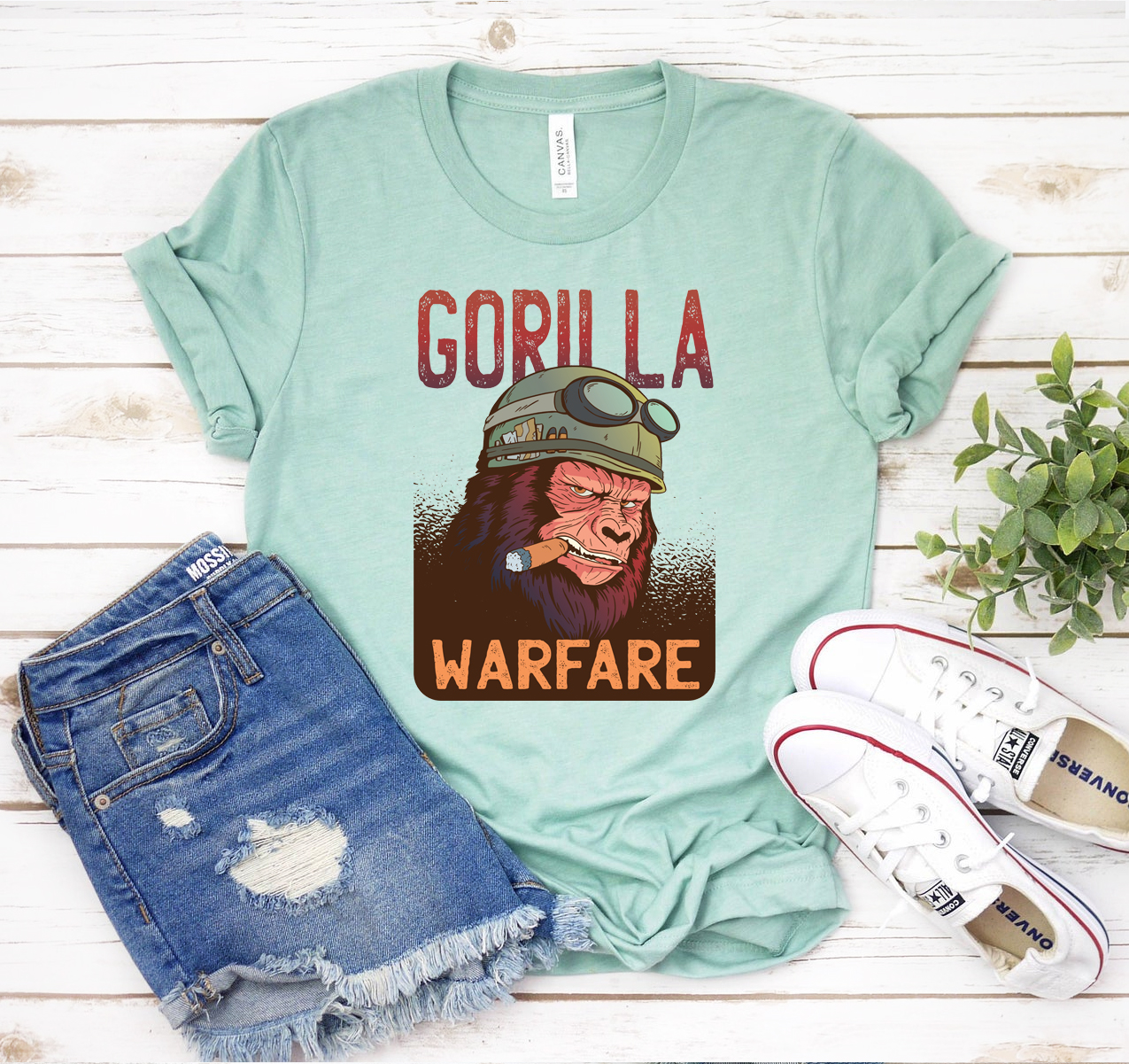 Gorilla Warfare T-shirt displayed on a mannequin, showcasing its unisex design and soft fabric.