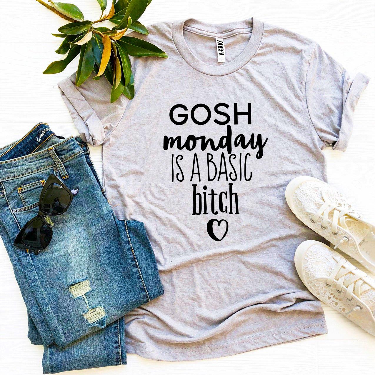 Gosh Monday Is a Basic Bitch T-shirt in various sizes, showcasing its premium quality and stylish design.