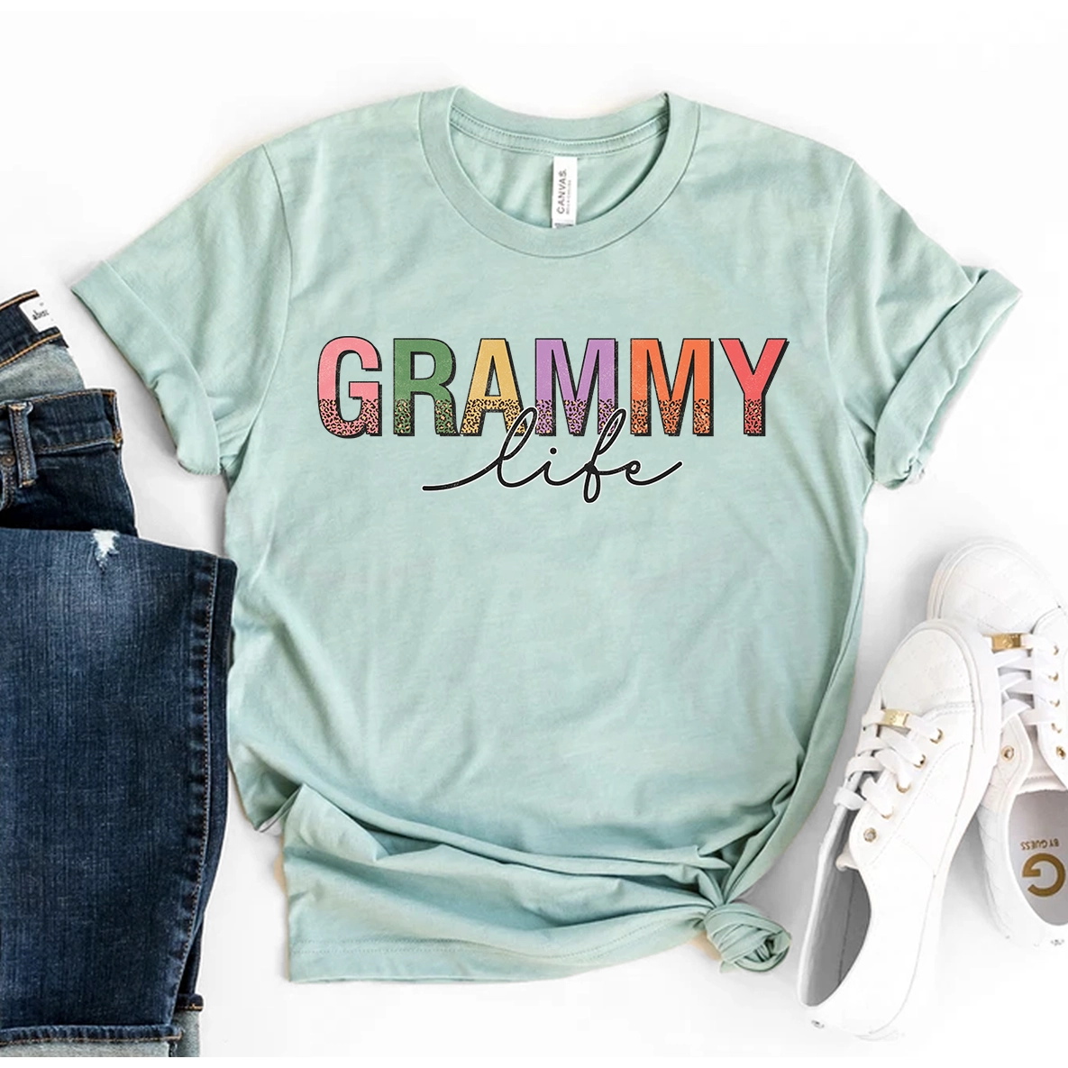 A stylish Grammy Life T-shirt made from premium ring spun cotton, featuring a vibrant flex print design.