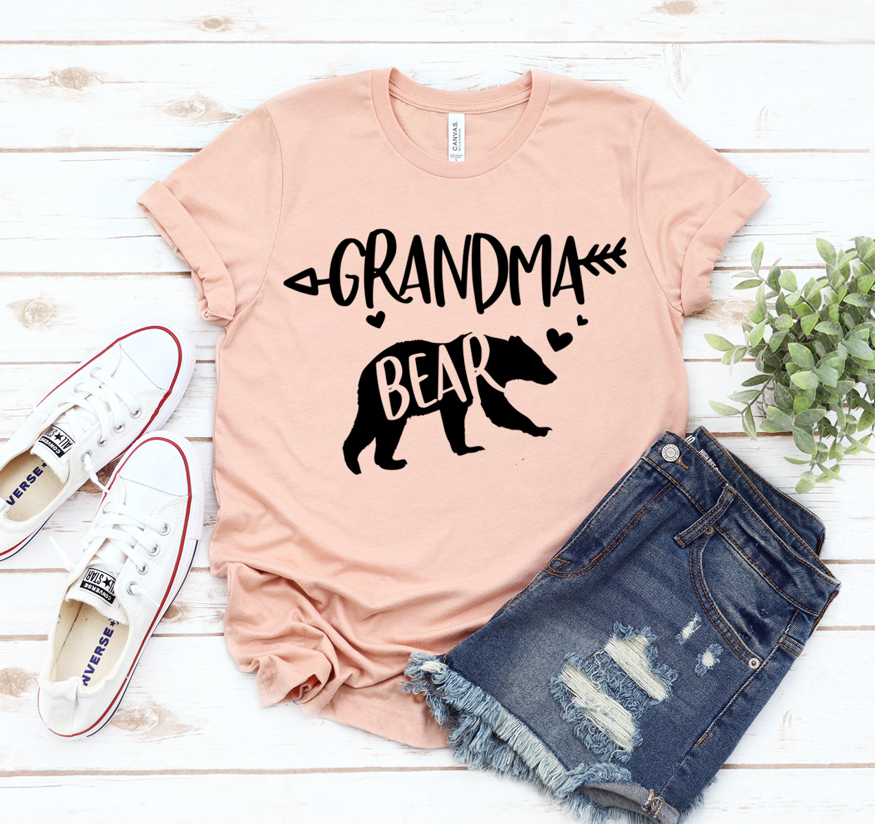 A soft, unisex Grandma Bear T-shirt made from high-quality cotton, featuring a stylish design perfect for grandmothers.