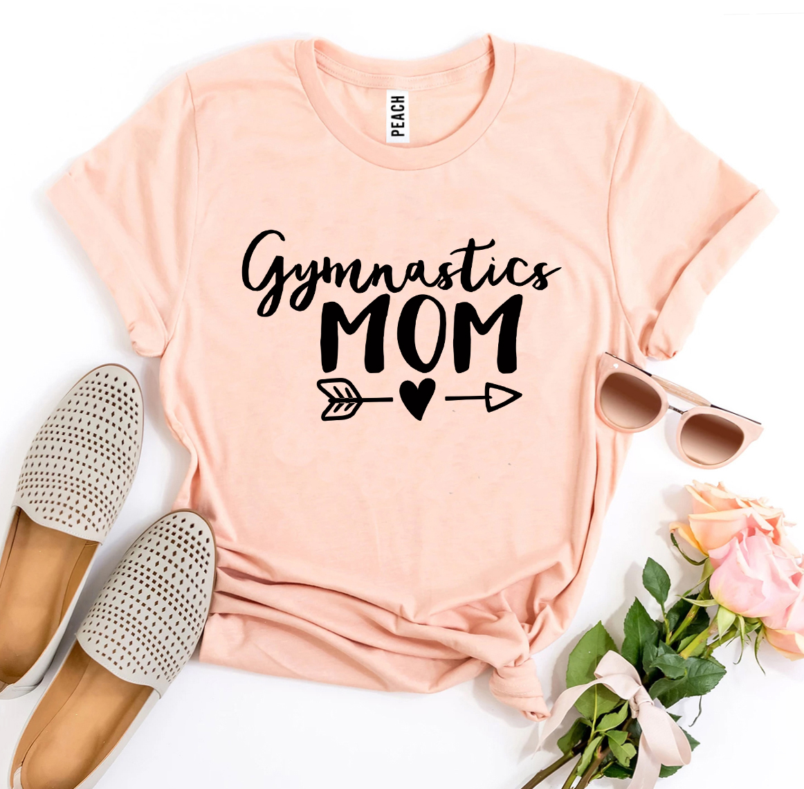 A stylish Gymnastics Mom T-shirt made from premium ring spun cotton, featuring a vibrant flex print design.