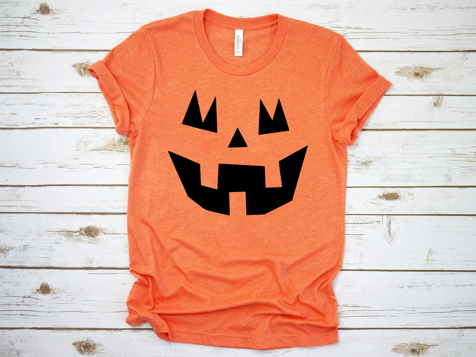 A classic unisex Halloween T-shirt made from soft Bella Canvas fabric, showcasing its comfortable fit and available sizes.