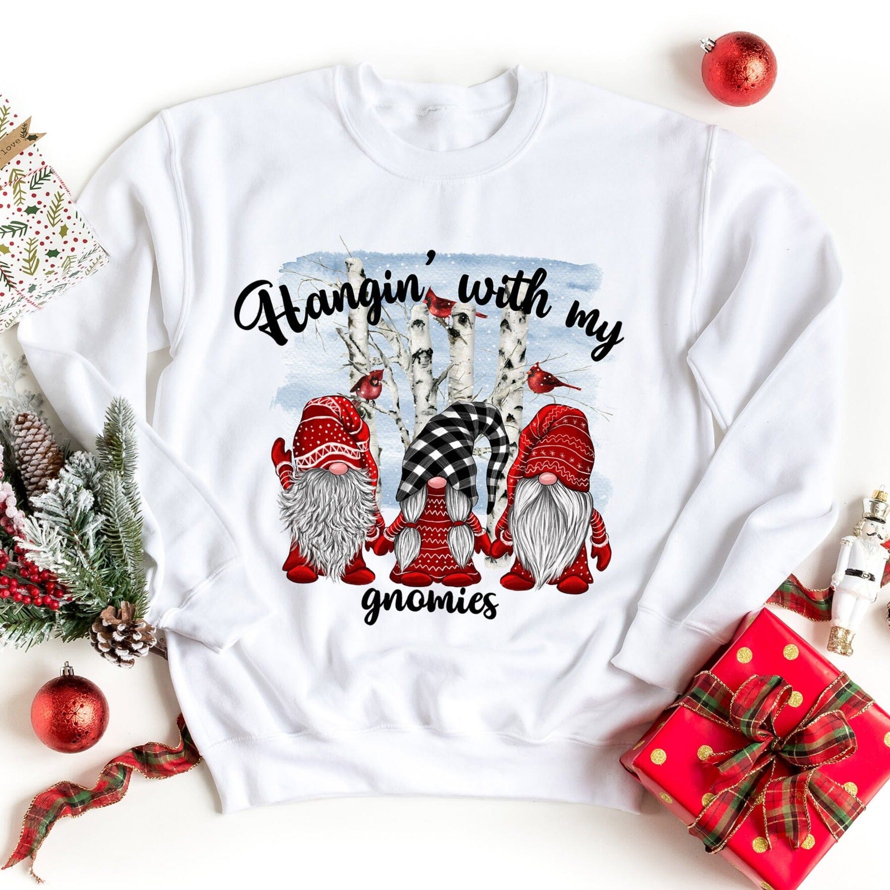 A festive Christmas top featuring playful gnomes, perfect for holiday celebrations, made from soft and comfortable fabric.