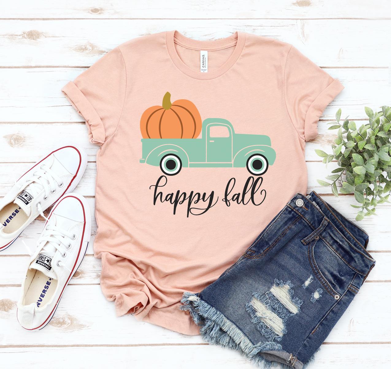 Happy Fall T-shirt featuring autumn-themed design on a classic unisex Bella Canvas tee.