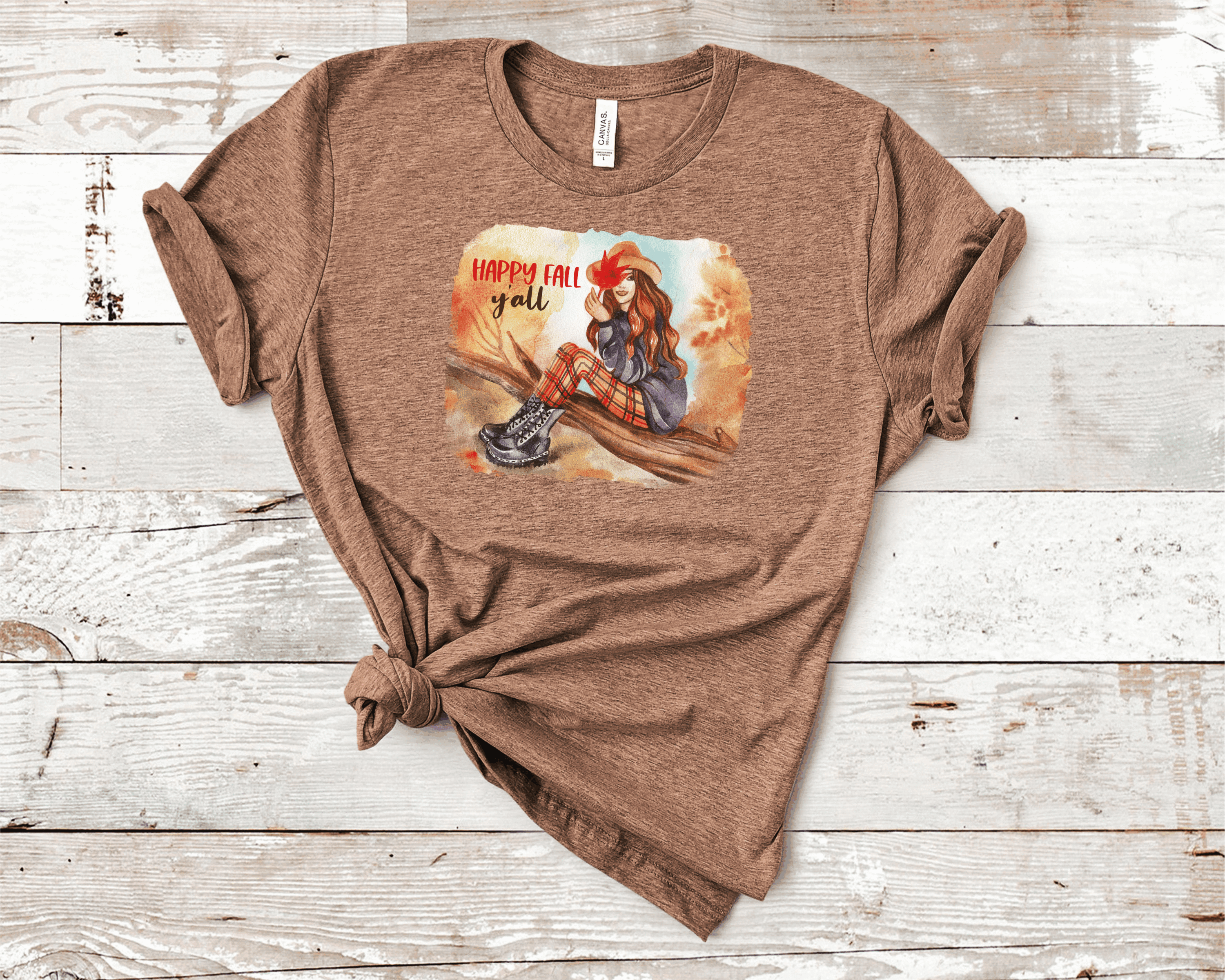 Happy Fall Y'all graphic tee featuring autumn-themed design on a soft Bella Canvas unisex t-shirt.