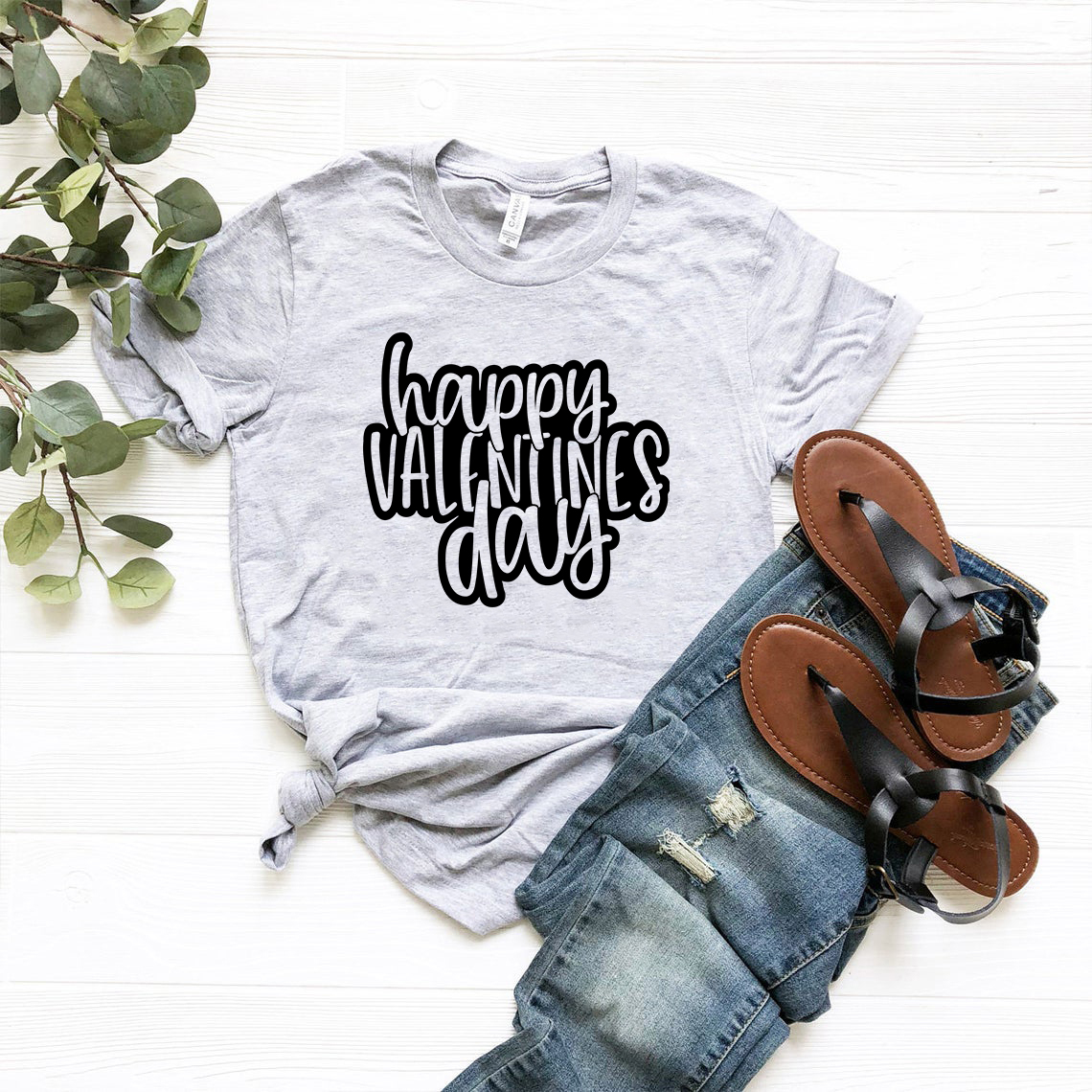 Happy Valentine Day Shirt in various colors, showcasing its unisex design and soft fabric.