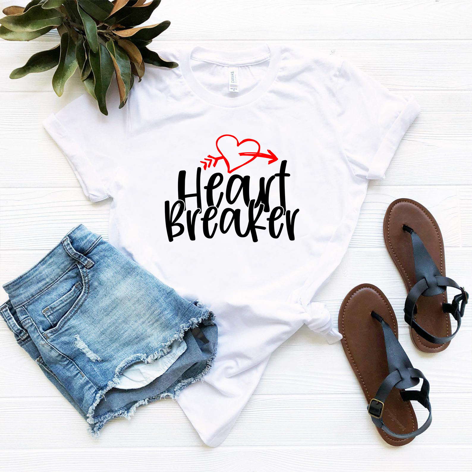 A stylish unisex Heart Breaker Shirt made from soft ring spun cotton, available in various colors and sizes.