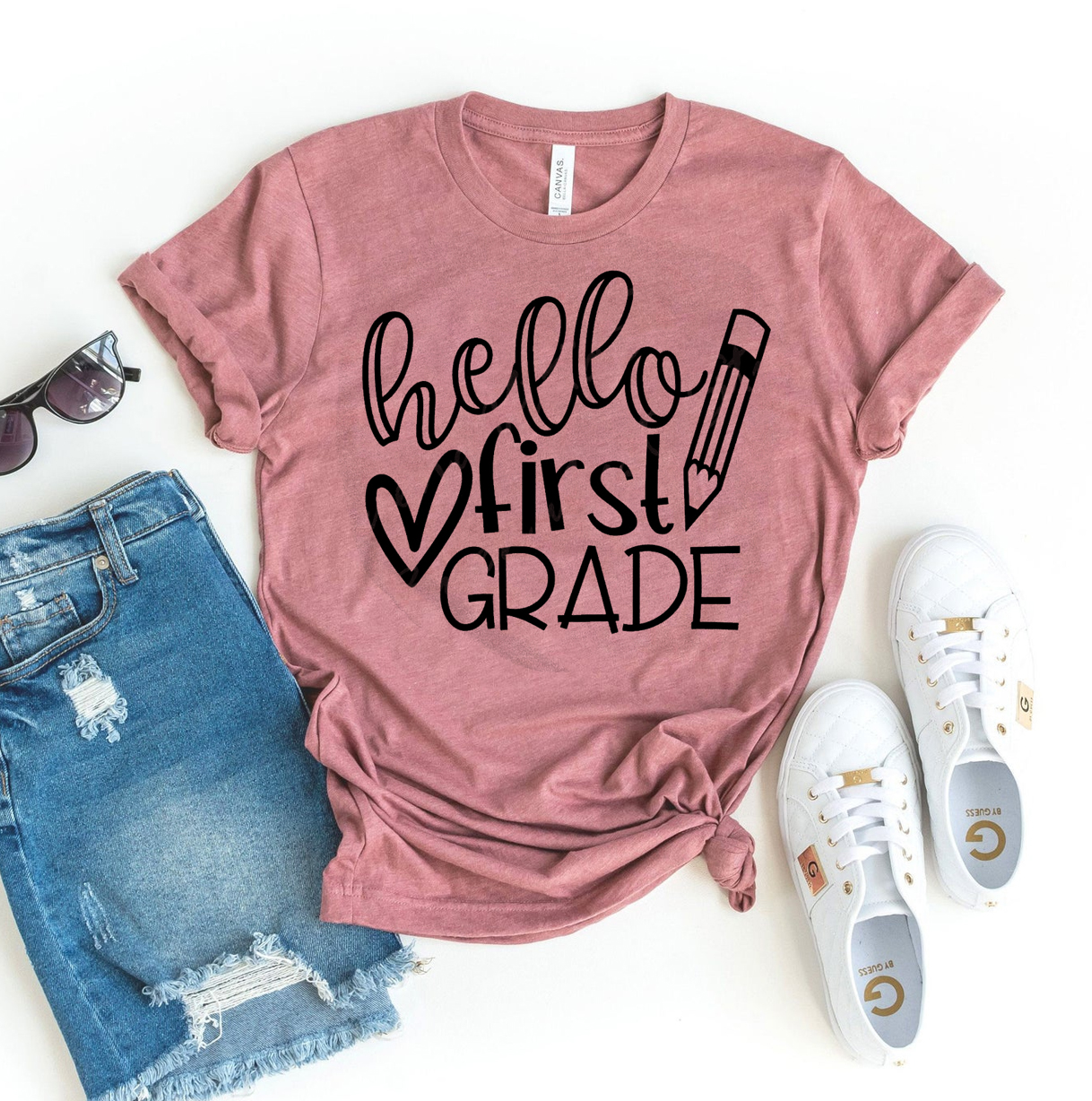 Hello First Grade T-shirt made of premium ring spun cotton with a colorful design celebrating first grade.