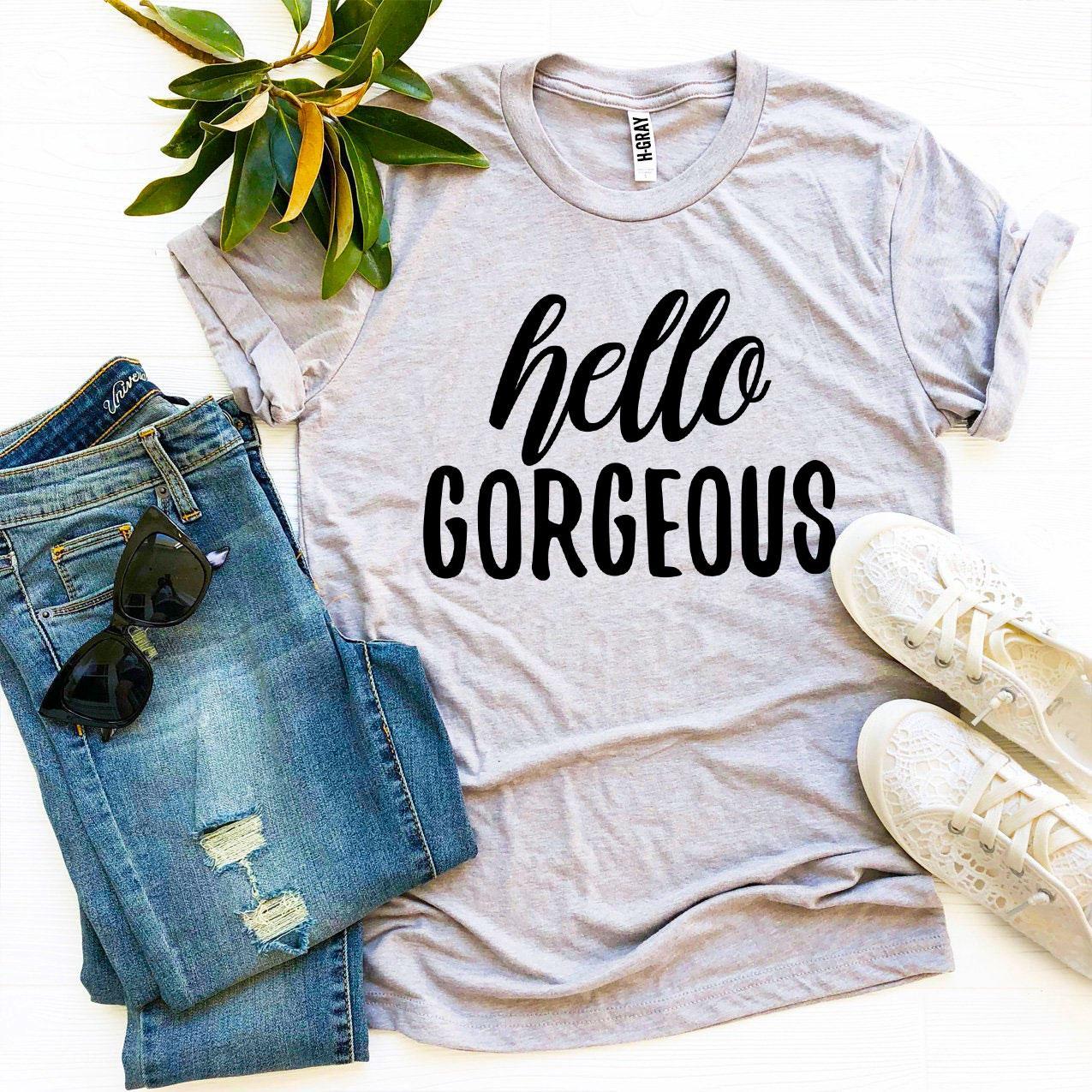 Hello Gorgeous T-shirt made of premium ring spun cotton, featuring a soft textile flex print design in various sizes.