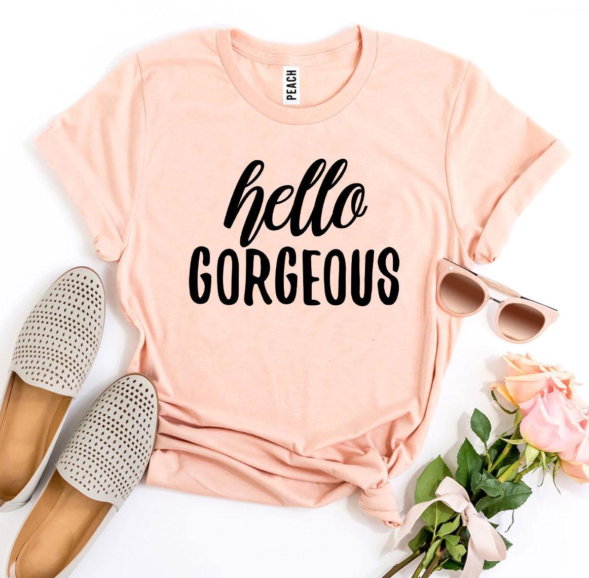 Hello Gorgeous T-shirt made of premium ring spun cotton, featuring a soft textile flex print design in various sizes.