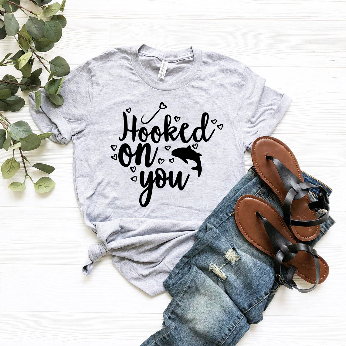 A stylish unisex Hooked On You Shirt made from soft ring spun cotton, available in multiple colors and sizes.