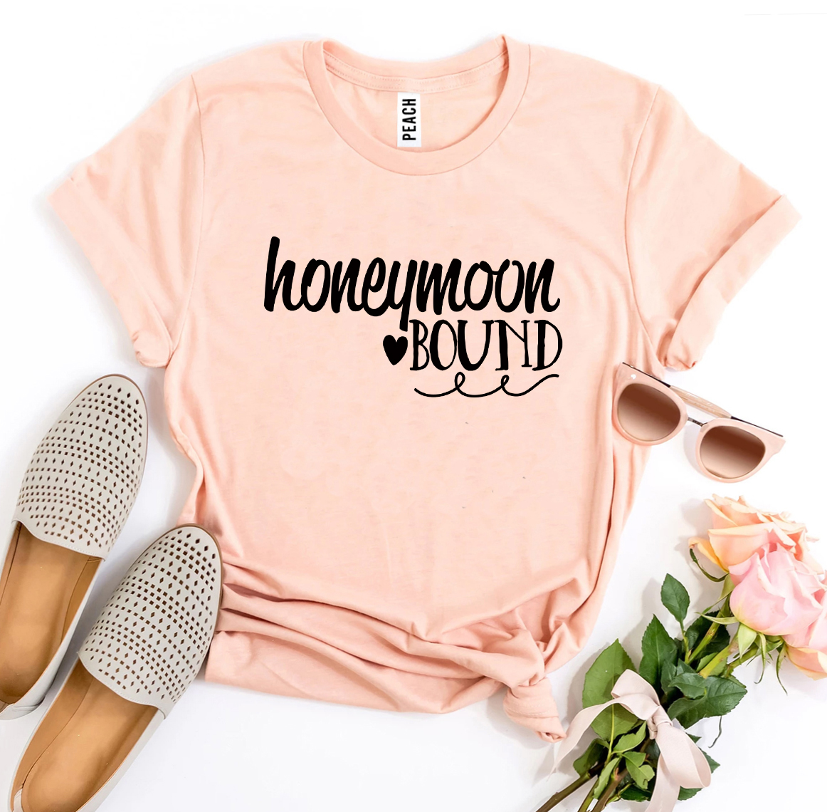 Honeymoon Bound T-shirt made of premium ring spun cotton with a stylish design, available in various sizes.