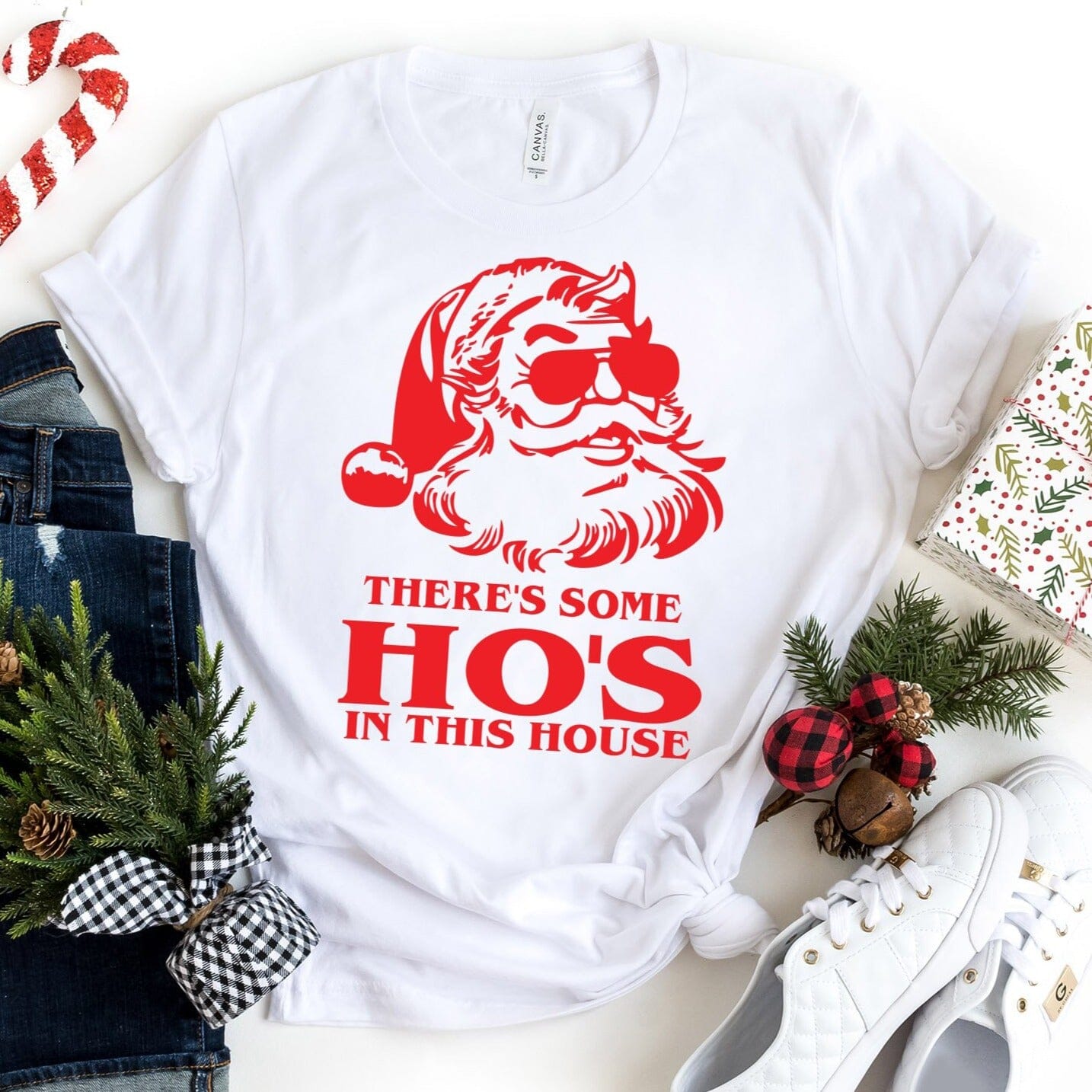 Ho's In This House Christmas T-Shirt featuring a humorous design, made from soft Ringspun Cotton, perfect for festive celebrations.