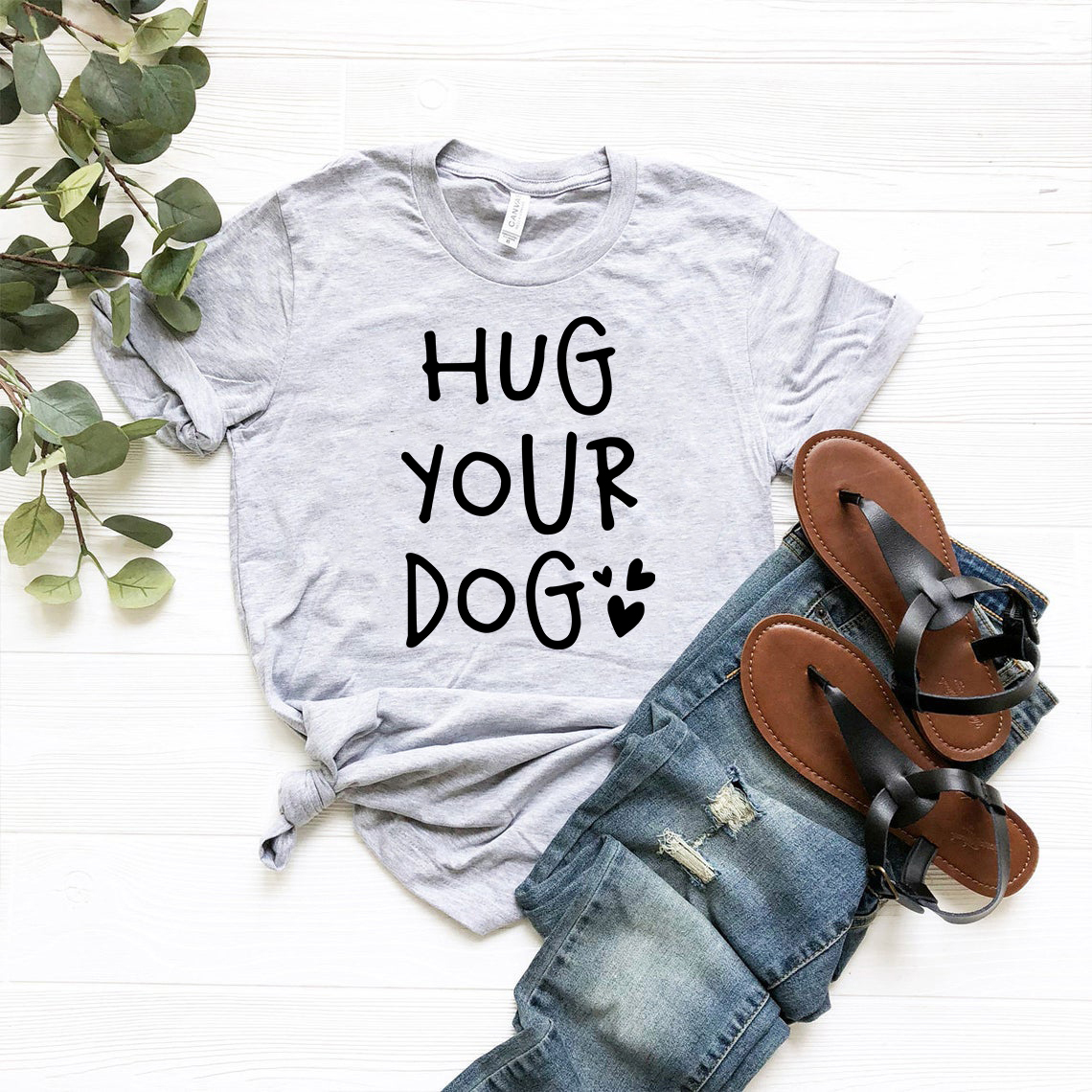 A comfortable unisex Hug Your Dog Shirt in various colors, showcasing a classic crew neck and short sleeves, perfect for dog lovers.