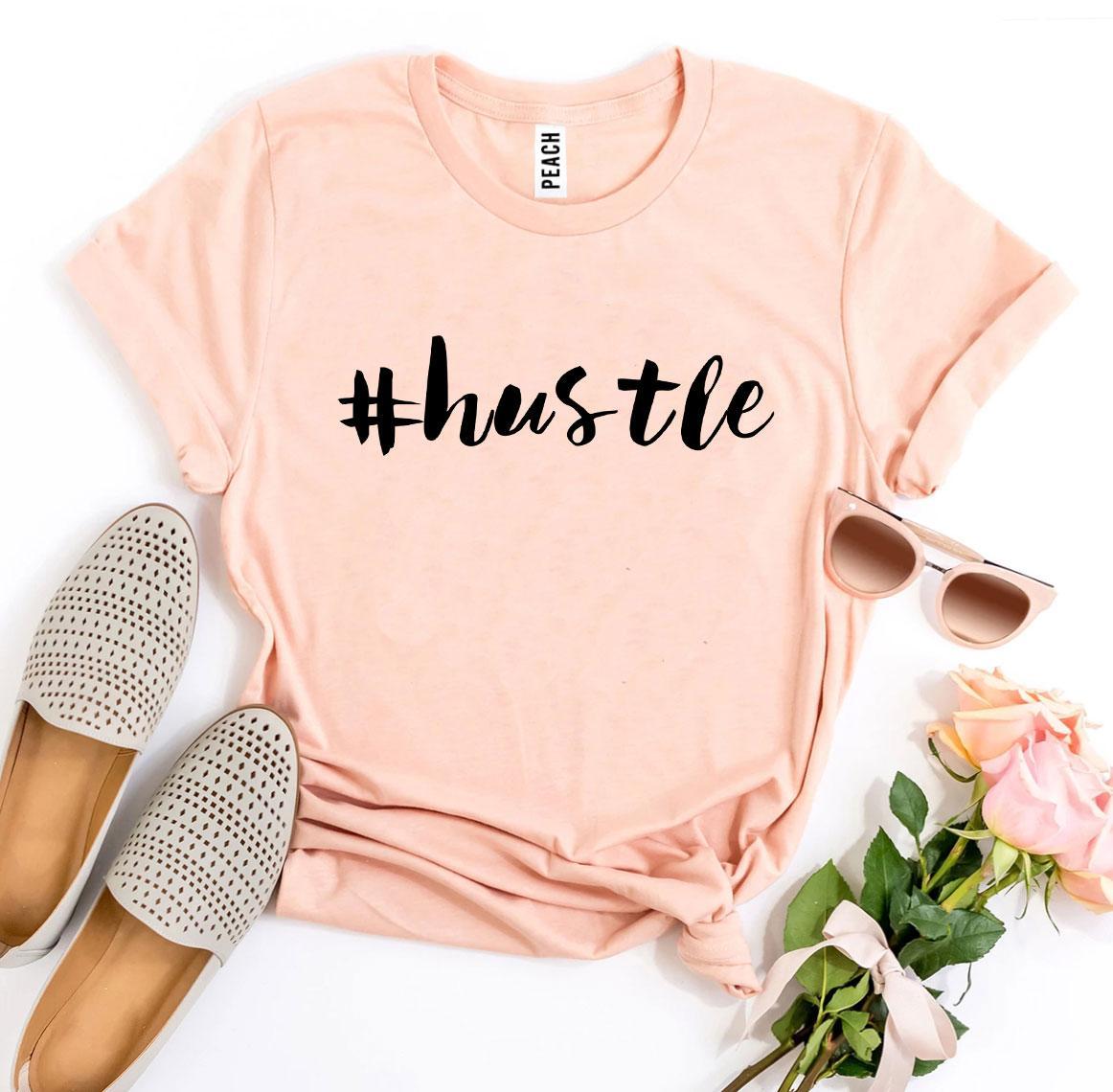 A stylish #Hustle T-shirt made from premium ring spun cotton, featuring a soft textile flex print design.