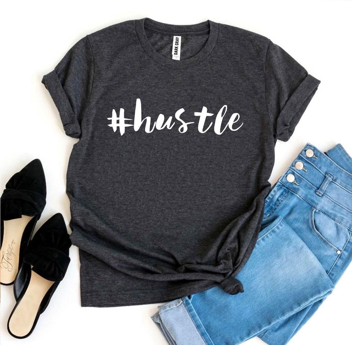 A stylish #Hustle T-shirt made from premium ring spun cotton, featuring a soft textile flex print design.