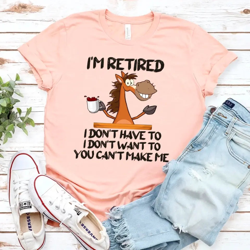 A comfortable and stylish 'I Am Retired I Don't Have To Tee' shirt displayed on a hanger, showcasing its soft fabric and modern fit.