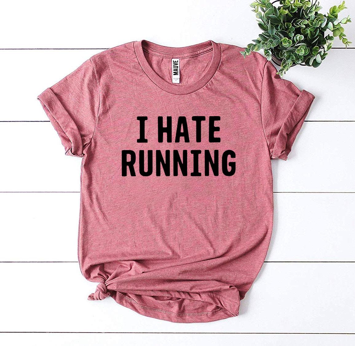 I Hate Running T-shirt made of premium ring spun cotton with a humorous print, available in various sizes.