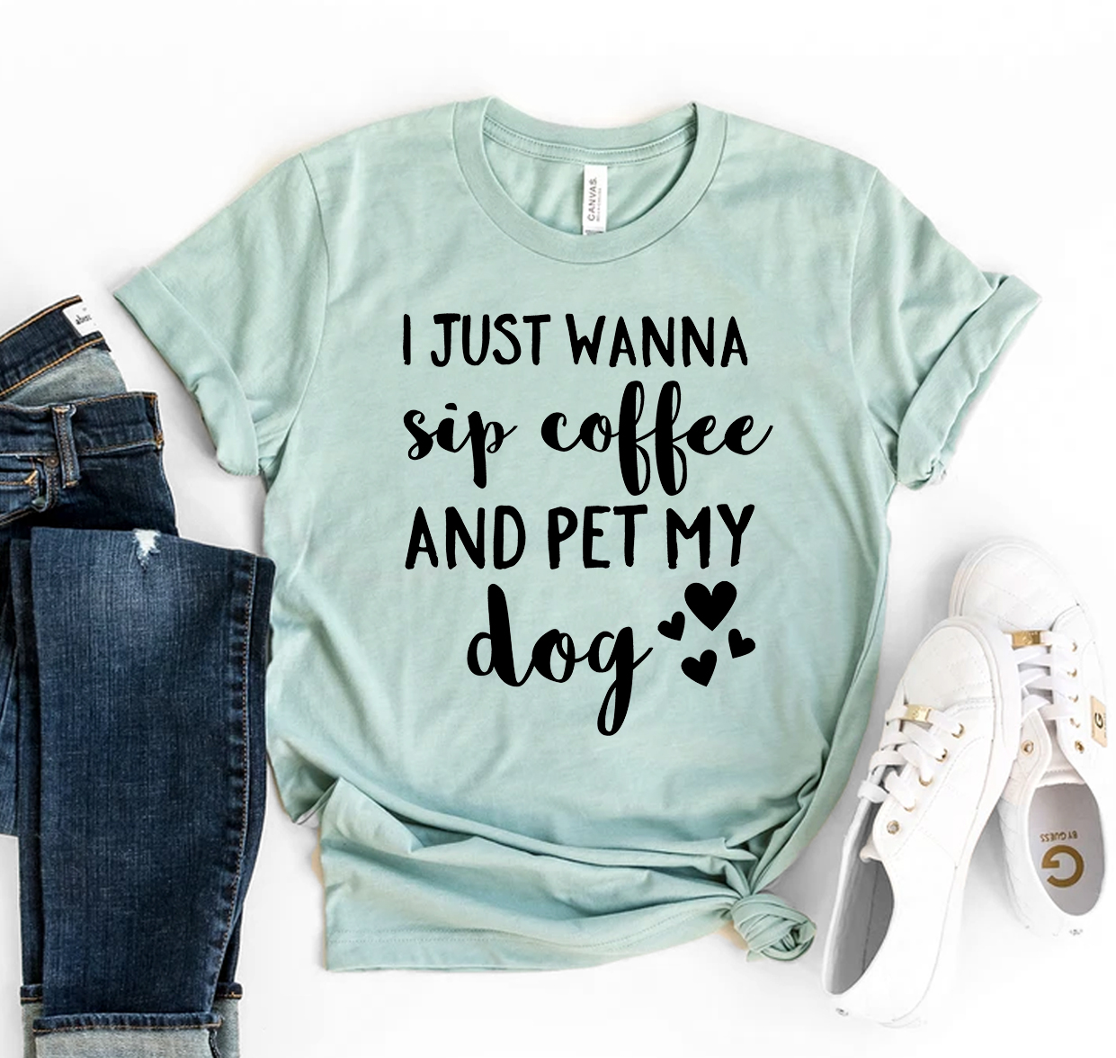 A soft, premium quality t-shirt featuring the quote 'I Just Want To Sip Coffee And Pet My Dog', perfect for dog lovers.