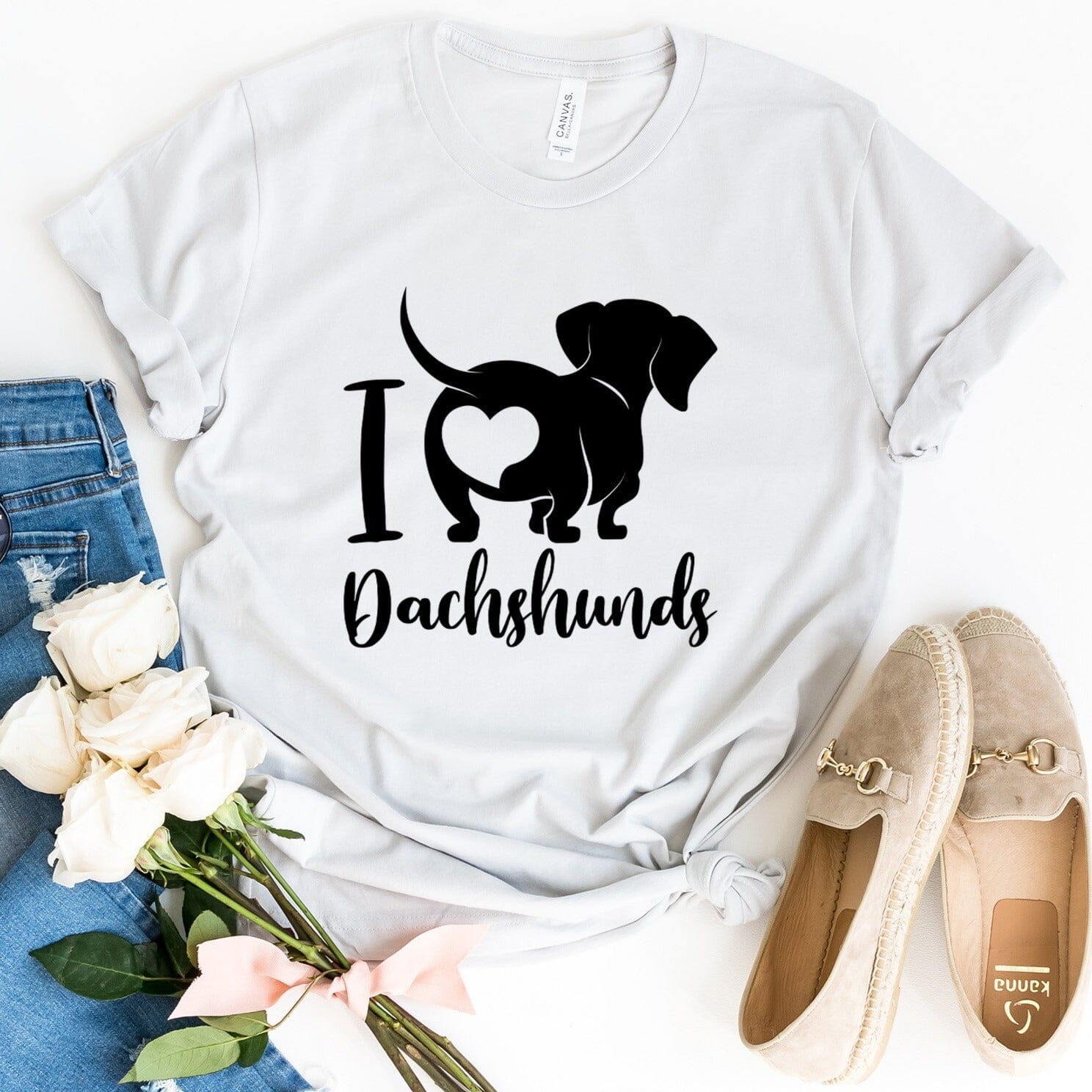 A stylish I Love Dachshunds Tee featuring a cute dachshund graphic, made from soft cotton fabric, perfect for dog lovers.