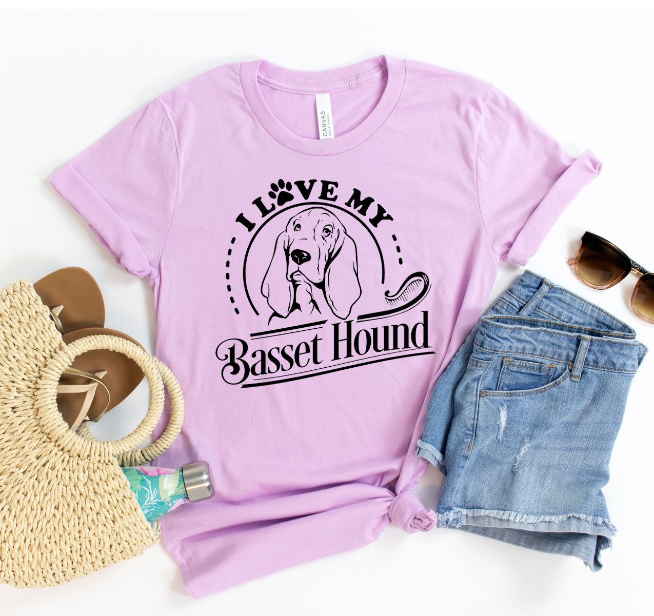 A stylish unisex T-shirt featuring the phrase 'I Love My Basset Hound' in a fun design, made from soft cotton fabric.