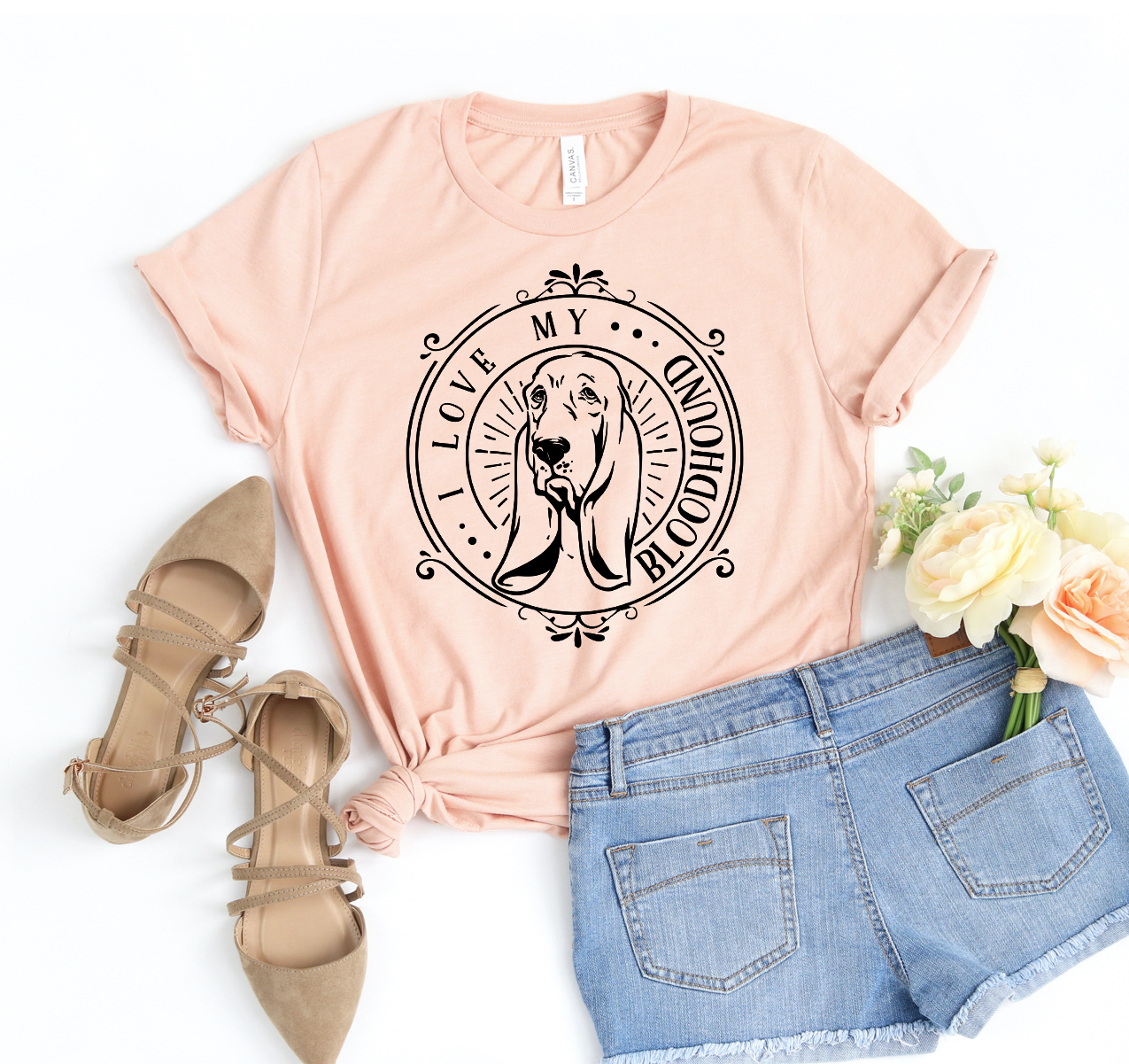 A stylish unisex T-shirt featuring the phrase 'I Love My Bloodhound', made from soft cotton fabric.