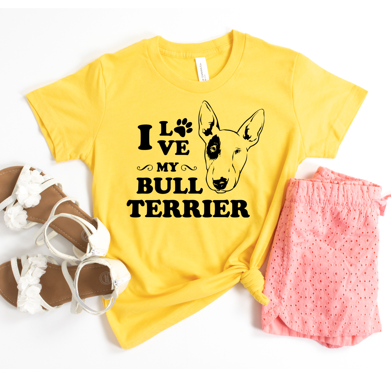 A stylish unisex t-shirt featuring the phrase 'I Love My Bull Terrier' in bold letters, made from soft cotton fabric.