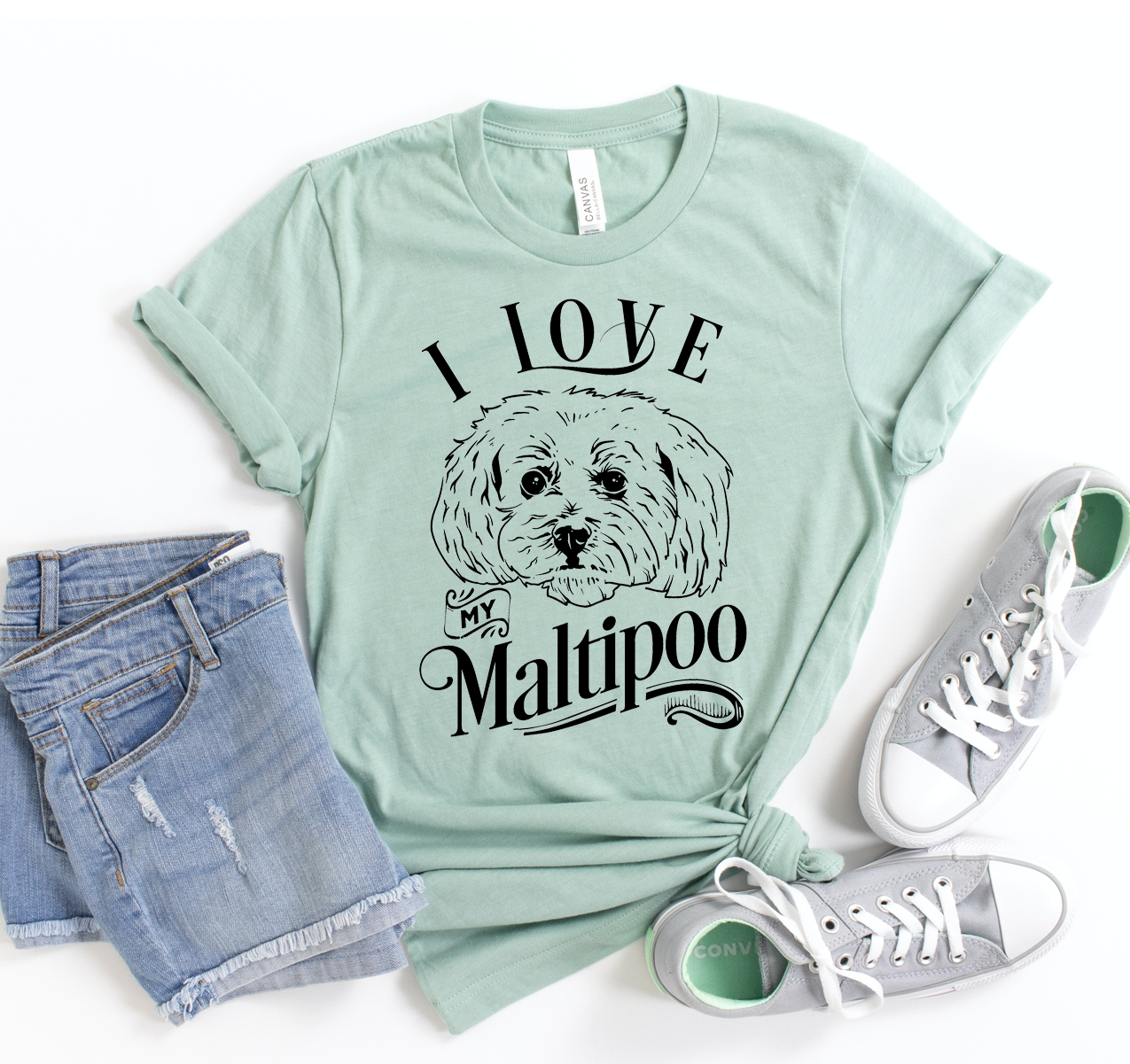 A stylish unisex T-shirt featuring the phrase 'I Love My Maltipoo', made from soft cotton fabric.