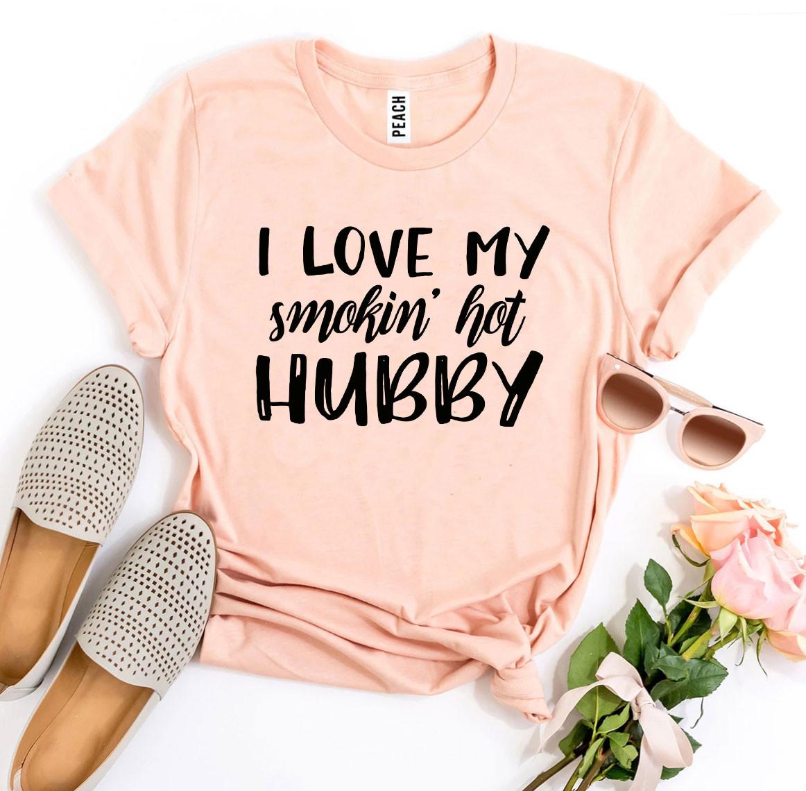 I Love My Smokin’ Hot Hubby T-shirt in various sizes, showcasing its soft cotton fabric and vibrant print design.