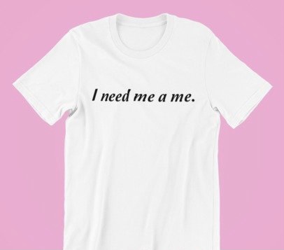 A stylish unisex shirt featuring the phrase 'I Need Me A Me' printed on high-quality cotton fabric, showcasing its classic fit and comfortable design.