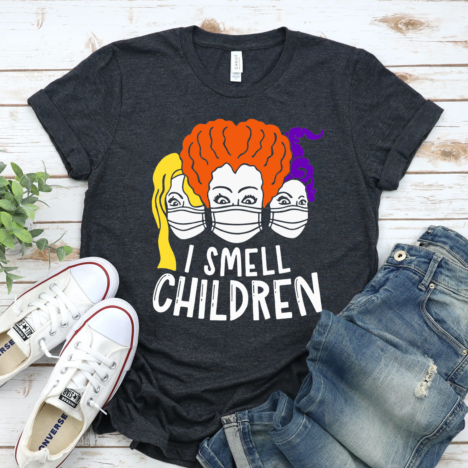 I Smell Children Halloween T-shirt in black with humorous text design, made from premium cotton.