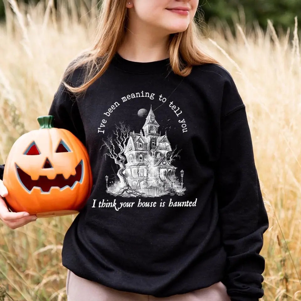 I Think You're House Is Haunted Seven Halloween Top featuring a spooky design, perfect for Halloween celebrations, made from soft cotton and polyester blend.